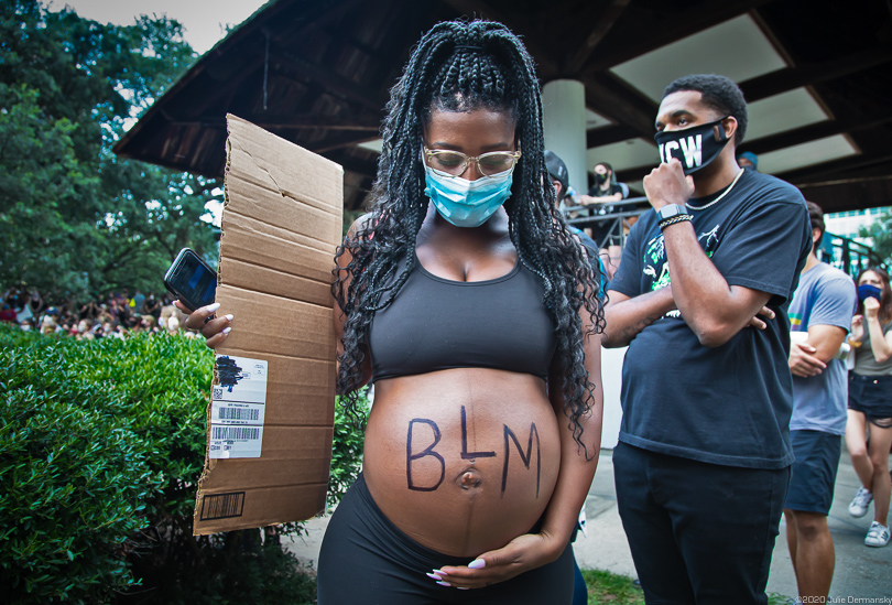 Pregnant woman at a rally in Duncan Plaza in New Orleans on the first day of 7 days of protest in solidarity with George Floyd