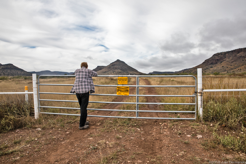 Mark Glover at entrance to Trans-Pecos pipeline transfer station near their home