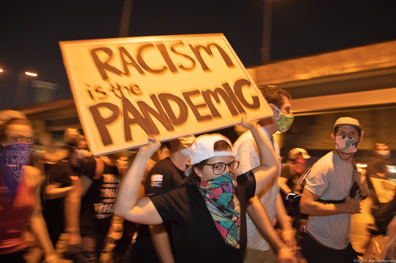 Anti-racism protesters marching up the Crescent City Connection bridge in New Orleans on June 3.