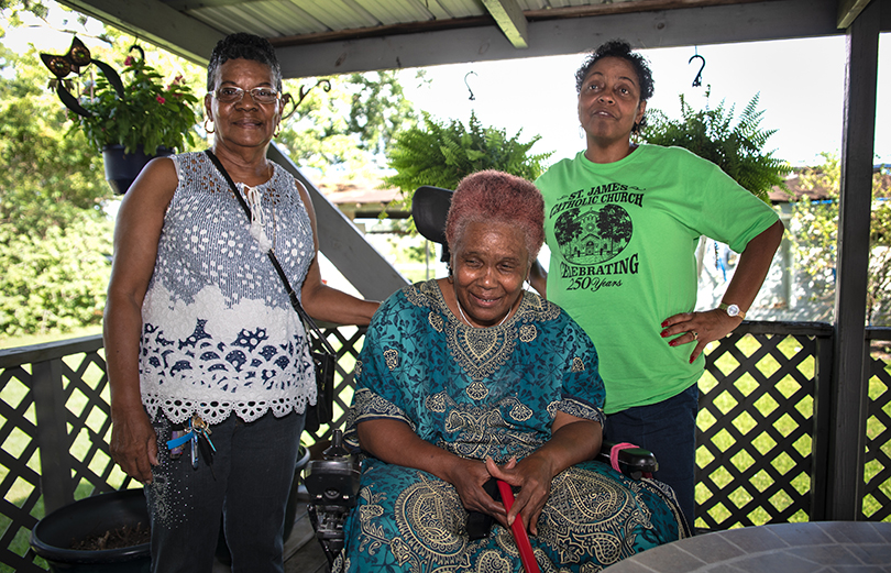 Geraldine Mayho, Sharon Lavigne, and Navis Prestley (seated)