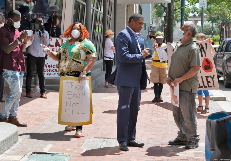 Rep. Cedric Richmond speaking to protesters about Cancer Alley pollution concerns