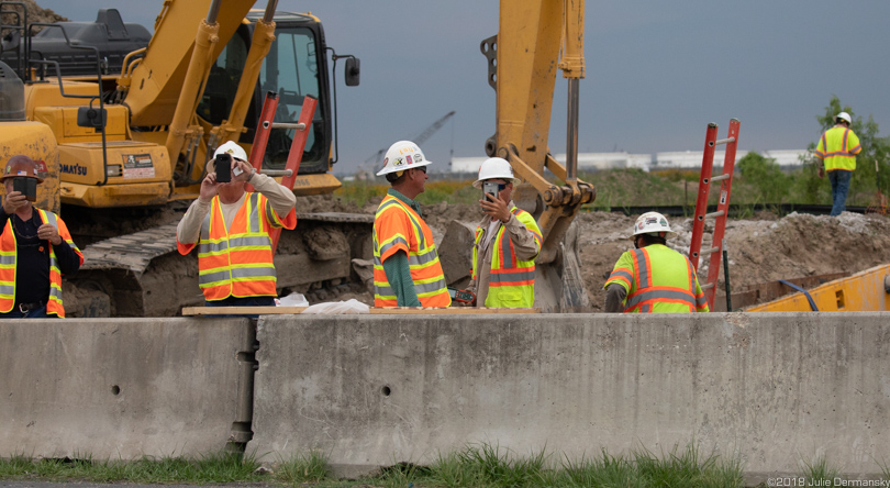 Bayou Bridge pipeline construction workers take cell phone photos of photojournalist Julie Dermansky