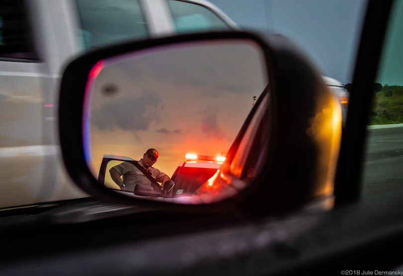 Local sheriff pulls up to see what photojournalist Julie Dermansky was doing at the pipeline construction site