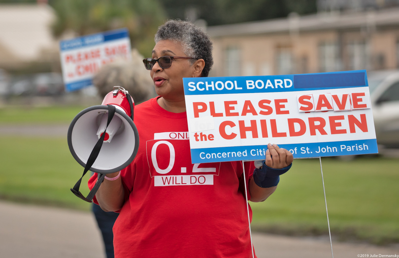 Tish Taylor, daughter of Robert Taylor, at a rally outside the Fifth Ward Elementary School