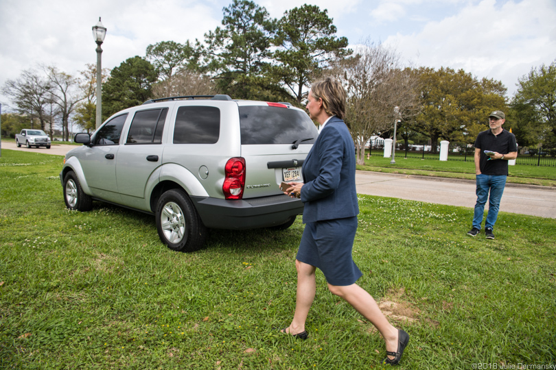 Anne Rolfes tries to catch who is inside an apparent security vehicle