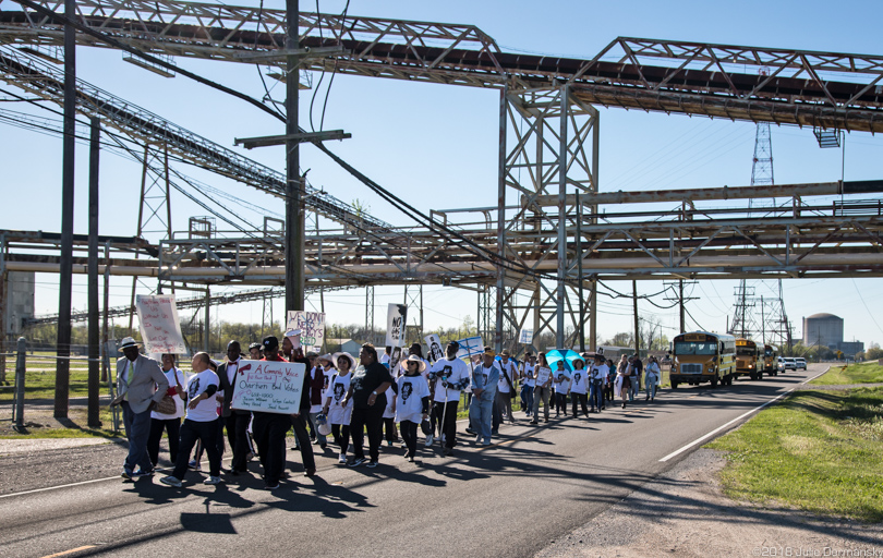 Protesters march against Entergy's proposed gas power plant through Cancer Alley