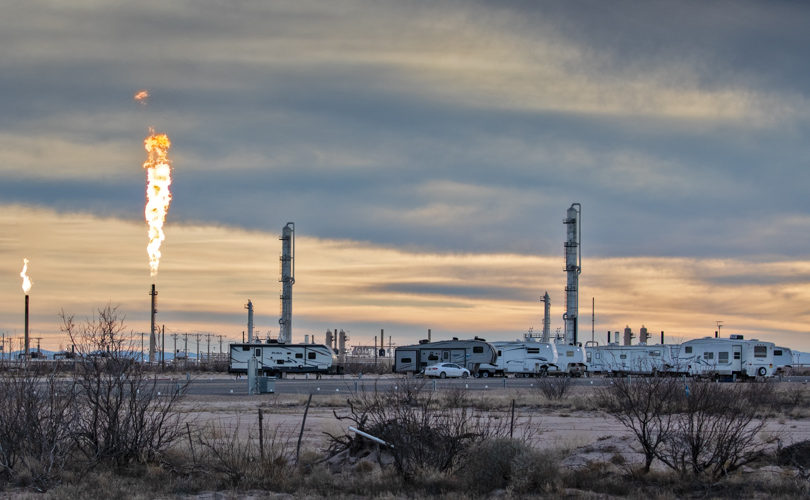 Flares at Eagle Claw Midstream Pecos Bend Gas Plant and a man camp