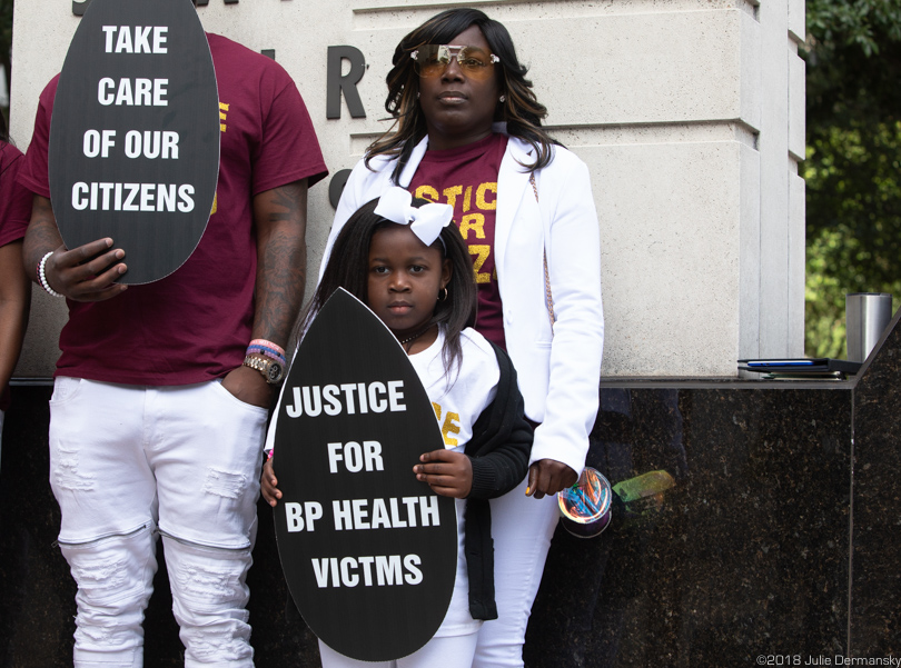 Tiffany Odoms and her daughter at a rally supporting BP oil spill workers