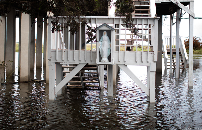 A raised home amid floodwaters on Isle de Jean Charles
