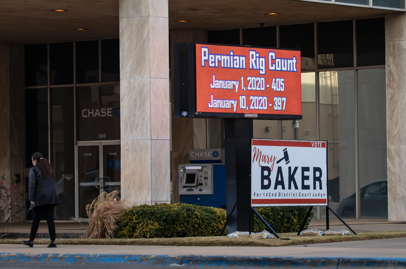 LED sign in Midland, Texas, showing oil rig counts and oil and gas prices