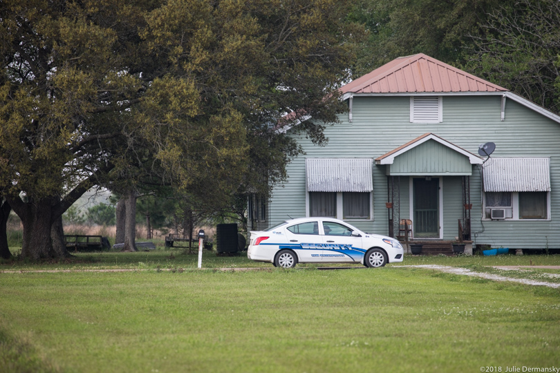 Security car from Hub Enterprises at the end of Hope Rosinski's driveway