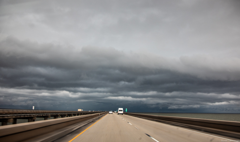 Spring rainclouds over the Causeway Bridge over Lake Pontchatrain.