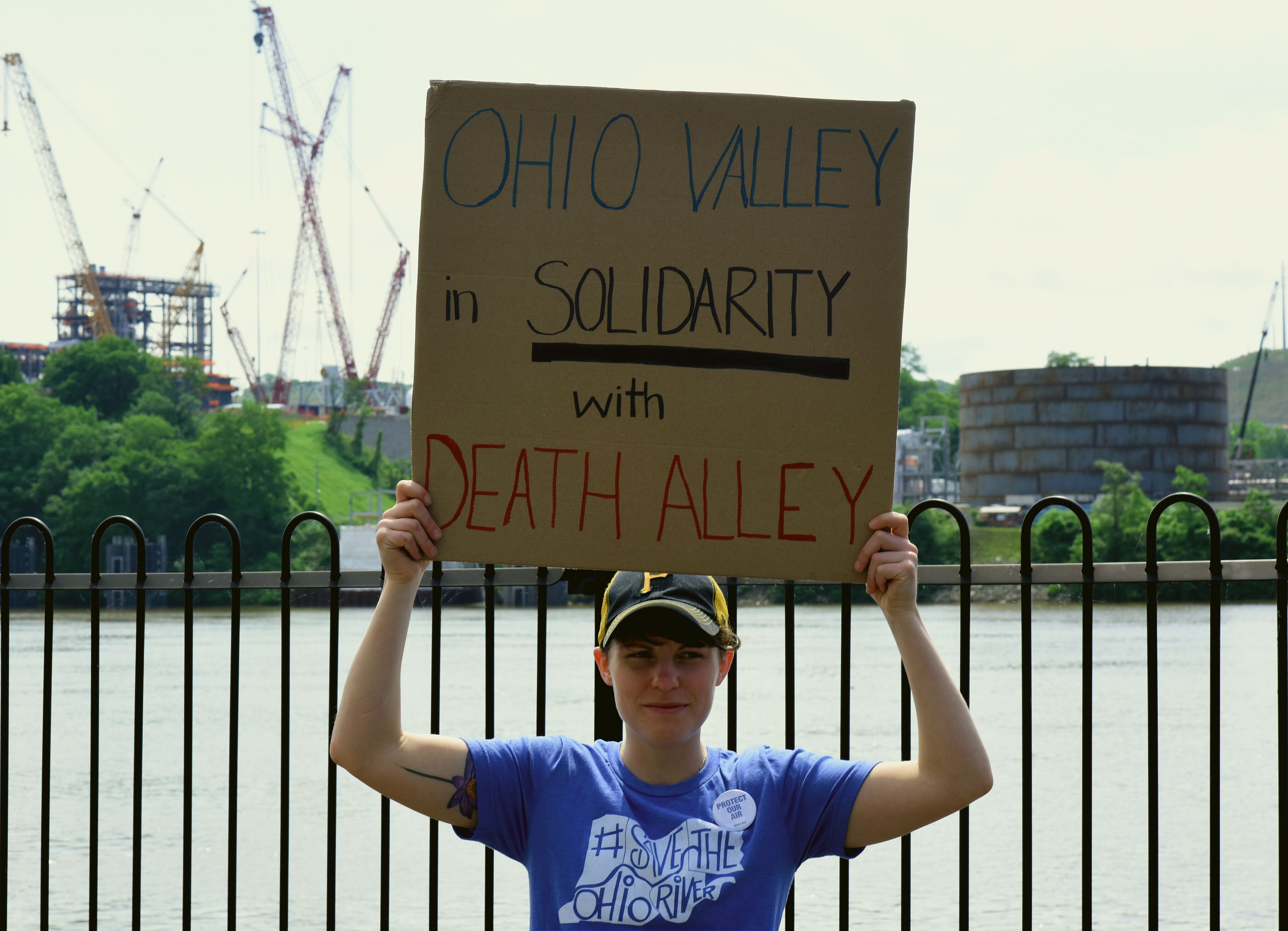 Bev Reed, who lives roughly 13 miles from the site of the proposed PTT cracker, holding a sign saying 'Ohio Vally in solidarity'