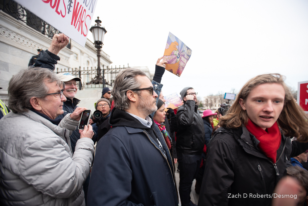 Actor Joaquin Phoenix amid the crowd anticipating arrest