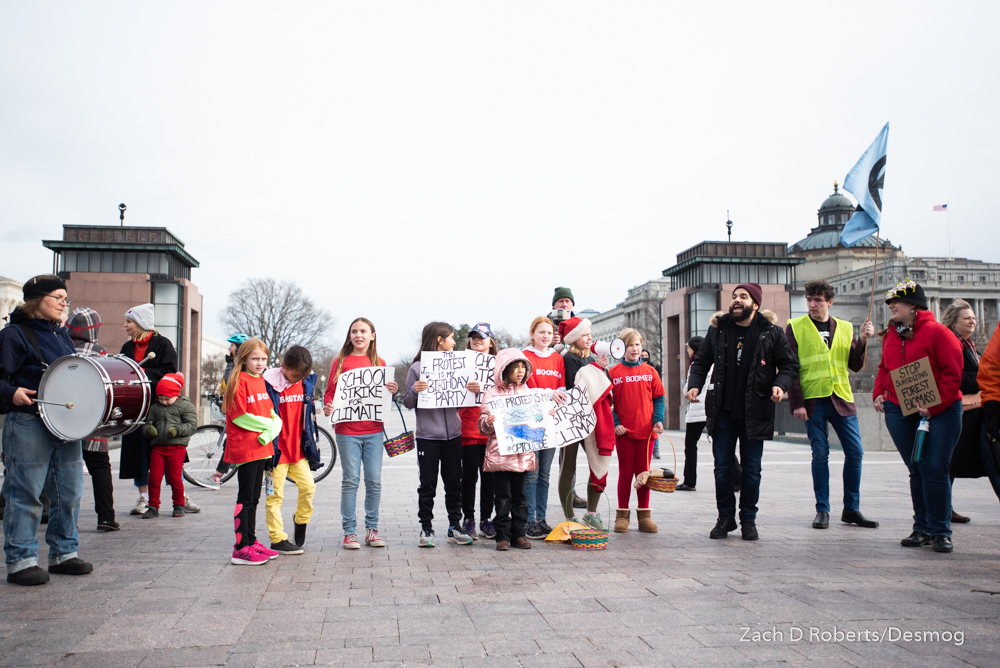 Children protesting among the rally goers