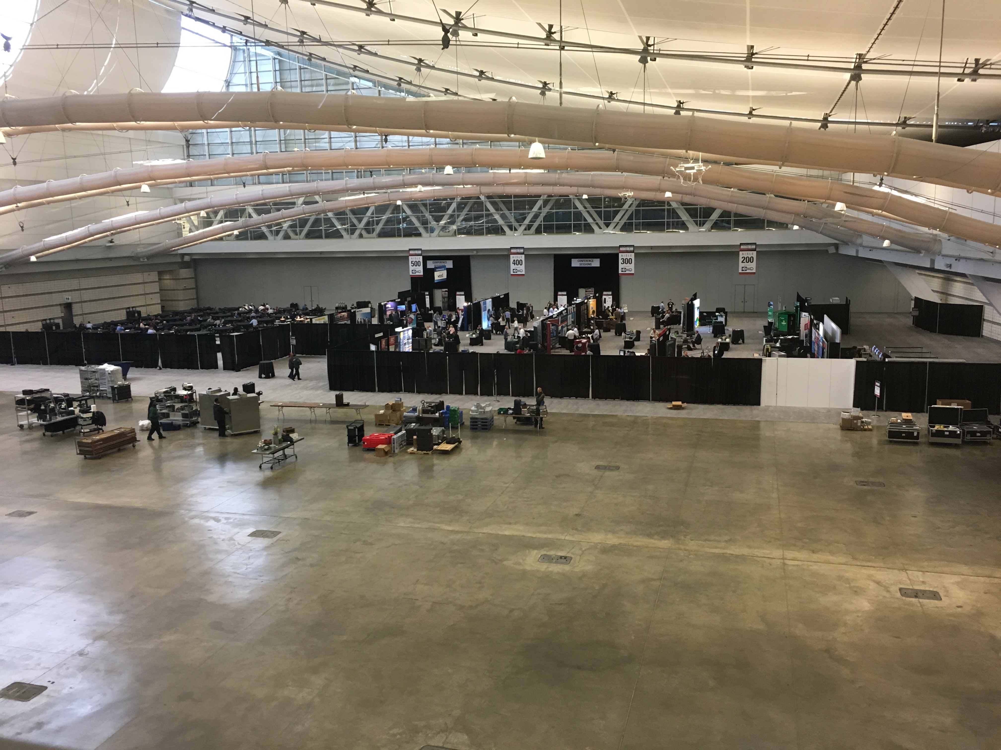 Trade show booths and luncheon tables at the 2019 Marcellus Utica Midstream conference, which occupied a smaller portion of the David L. Lawrence convention center in Pittsburgh than conferences in prior years. 