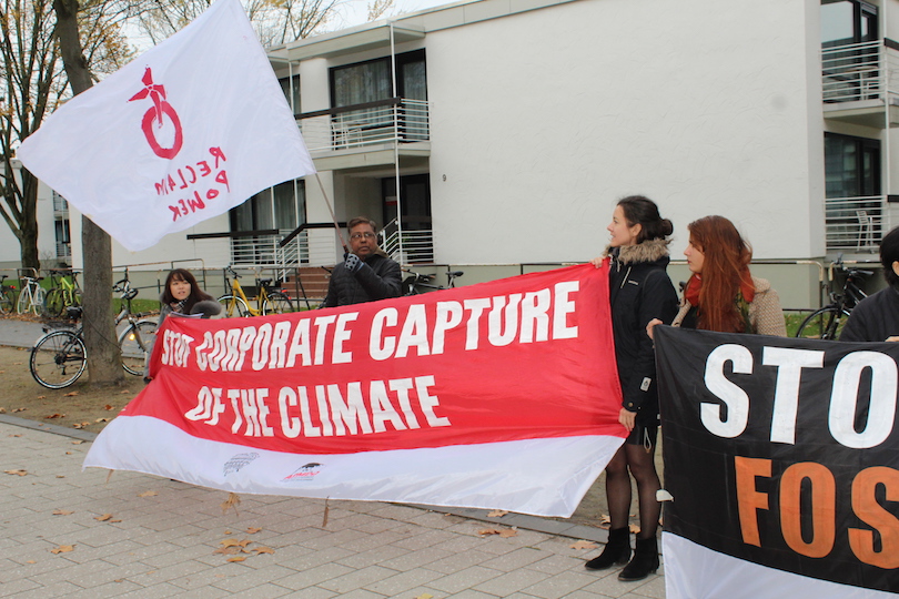 Activists protest corporate capture outside COP23 in Bonn, Germany