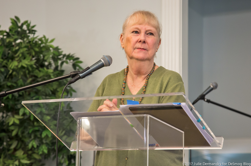 Wilma Subra from Louisiana Environmental Action Network speaks at a podium at a Concerned Citizens of St. John meeting