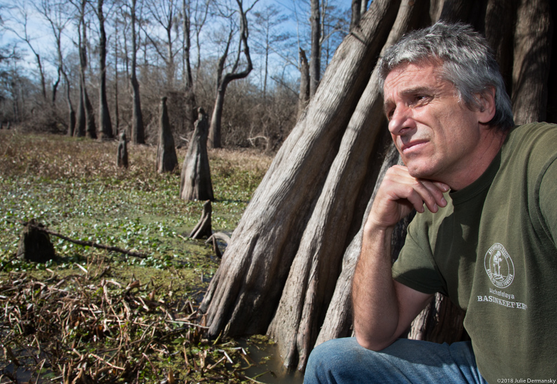 Dean Wilson of Atchafalaya Basinkeeper next to a legacy cypress tree