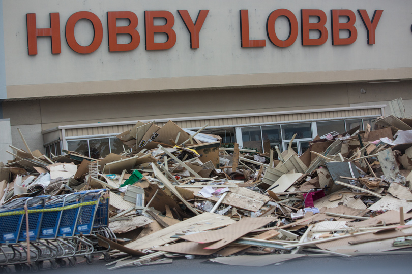 A pile of debris in front of a gutted Hobby Lobby store on O’Neal Lane in Baton Rouge on Sept 9.  