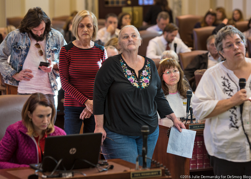 Jackie Dill waits to speak at a public hearing on earthquakes in the state capitol