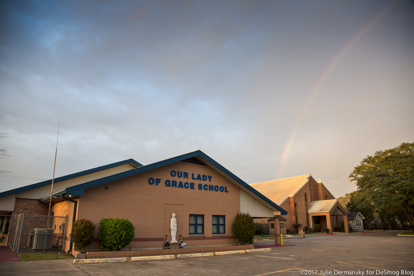 Outside view of Our Lady of Grace school in Reserve, Louisiana, with rainbow