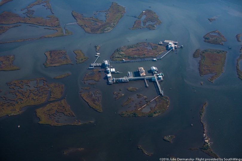 Buildings and other infrastructure dot the waters and disappearing coast in Plaquemines Parish.