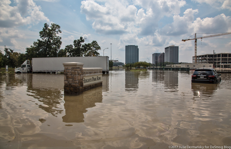 View of Houston oil and gas company corporate offices flooded across from an apartment building