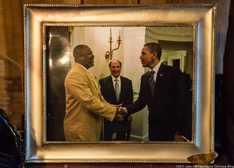 A framed photograph of Hilton Kelley with President Barack Obama