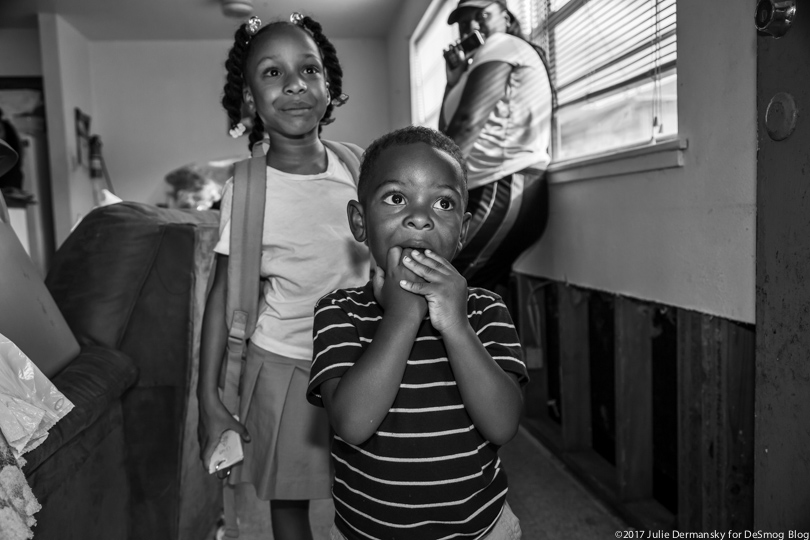 The young grandchildren of Pat Harris in her apartment damaged by Hurricane Harvey