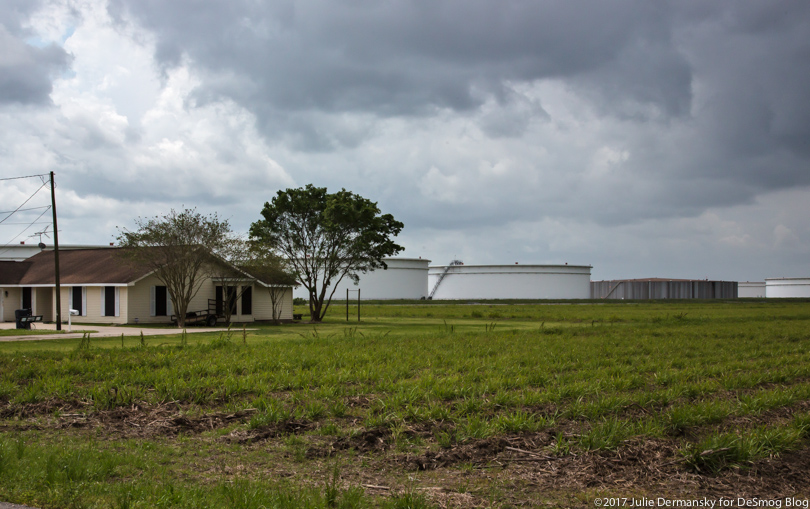 Oil storage tanks abut a home in St. James, Louisiana