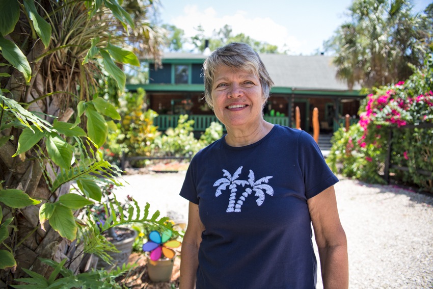 Pamela Duran in front of her home