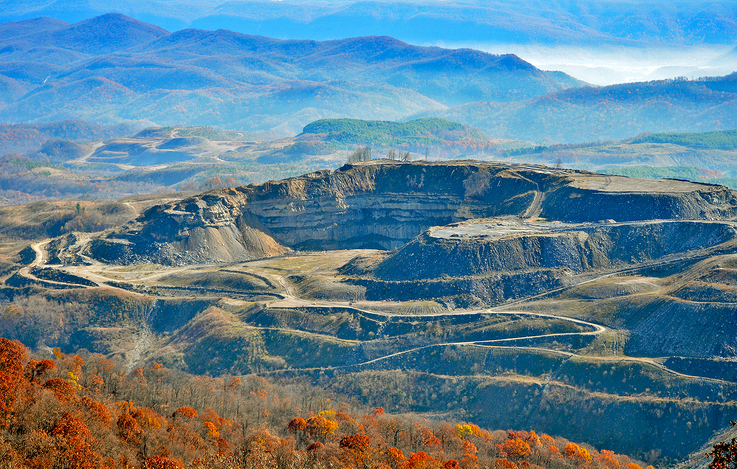 A highwall coal mine owned by West Virginia Gov. Jim Justice and his family sits unreclaimed in late 2017, years after an agreement with the commonwealth of Virginia originally mandated that cleanup be completed.
