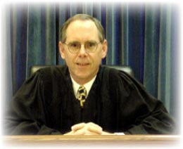Magistrate Judge Mark. R. Abel