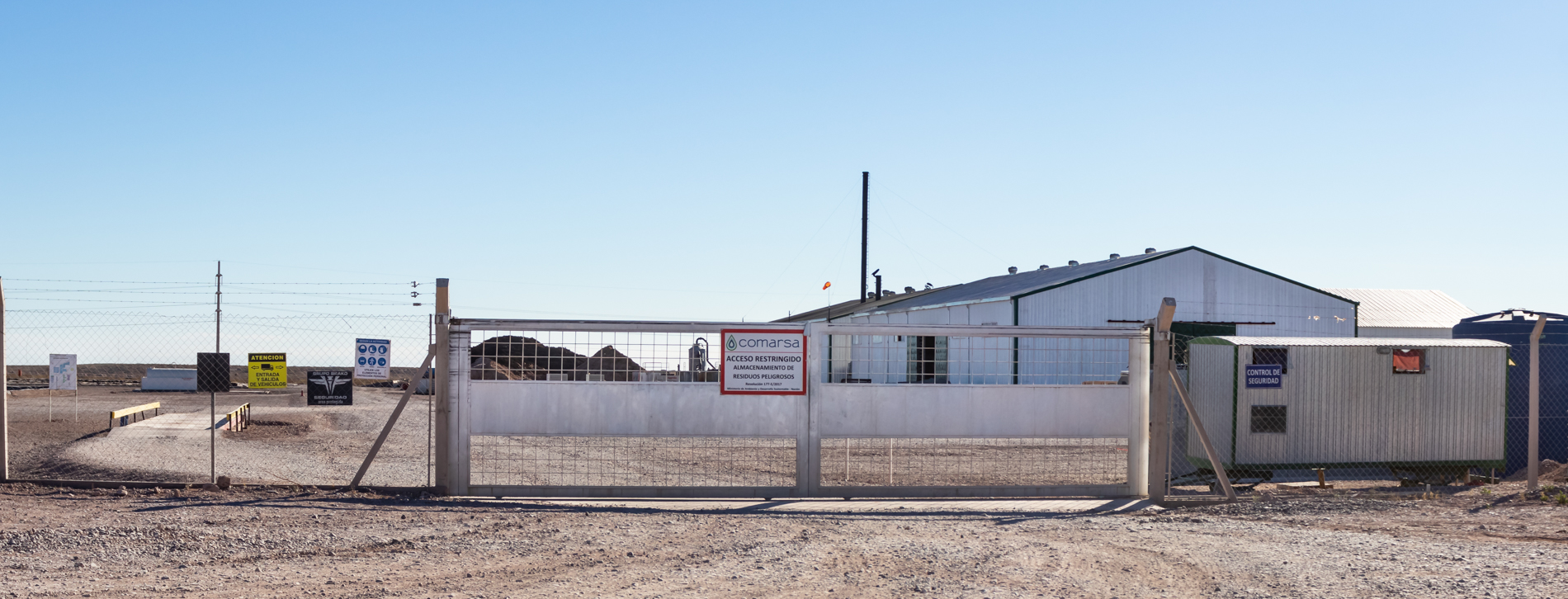 Outside the gates of Comarsa's Añelo oil and gas waste processing facility in Neuquén province, Argentina
