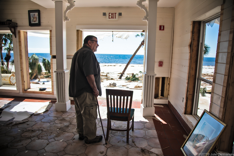 Owner of the Driftwood Inn inspects hurricane damage to his hotel in Mexico Beach
