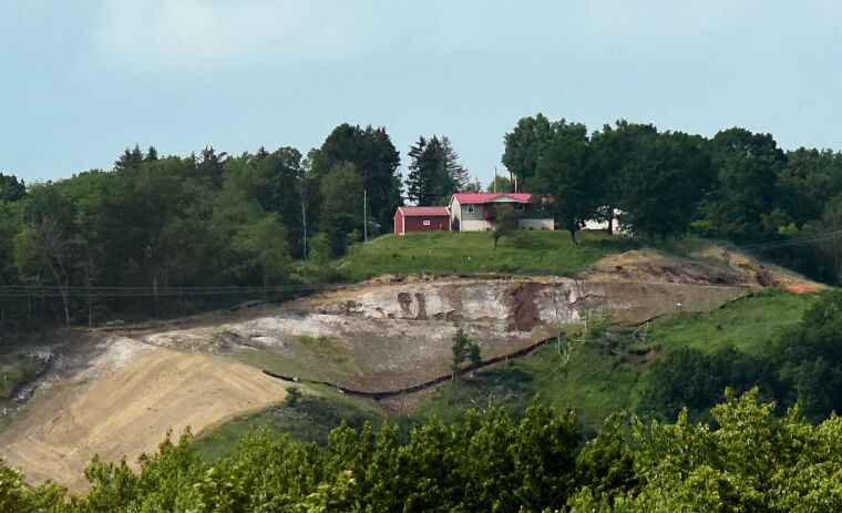 The hillside where the Revolution pipeline burst last year