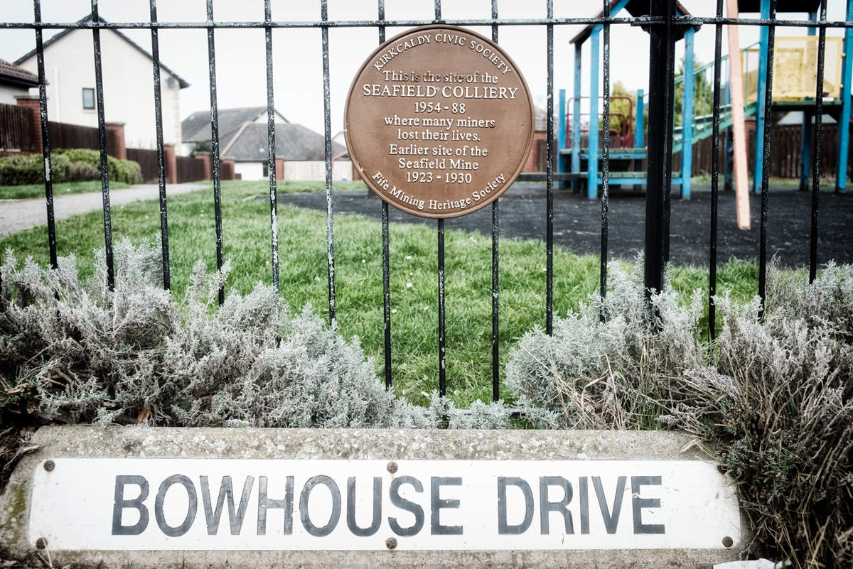 A plaque marking the location of the Seafield Colliery in Fife. No trace now remains of the pit which was opened in 1960 with a projected life span of 150 years. It closed in 1988.