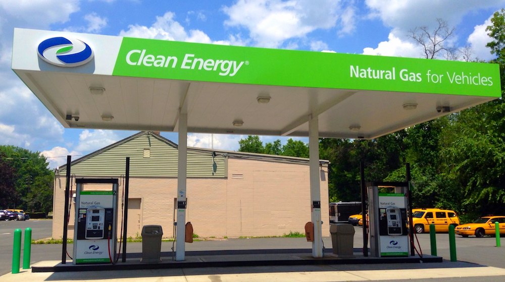 A natural gas vehicle fueling station labeled "clean energy."