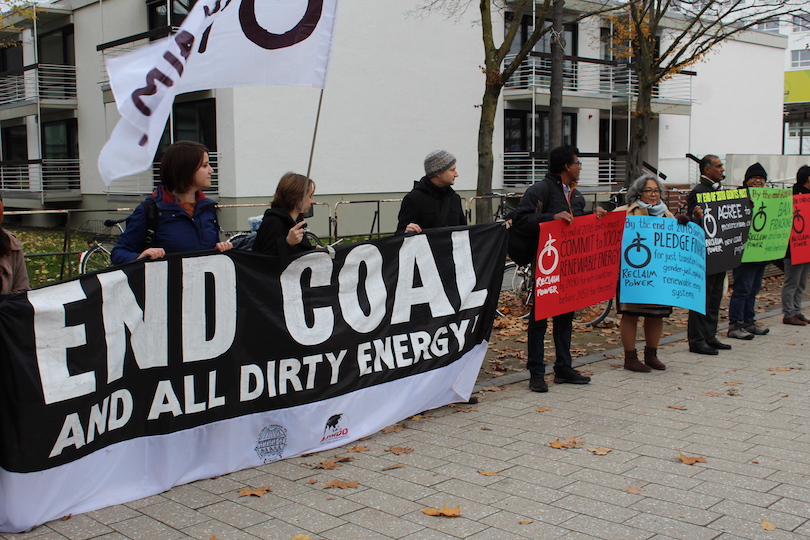 End coal sign and activists at UN climate talks in Bonn in 2017