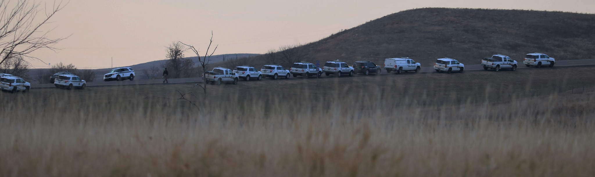 Police cars lined up at the bridge to the Dakota Access Pipeline in North Dakota