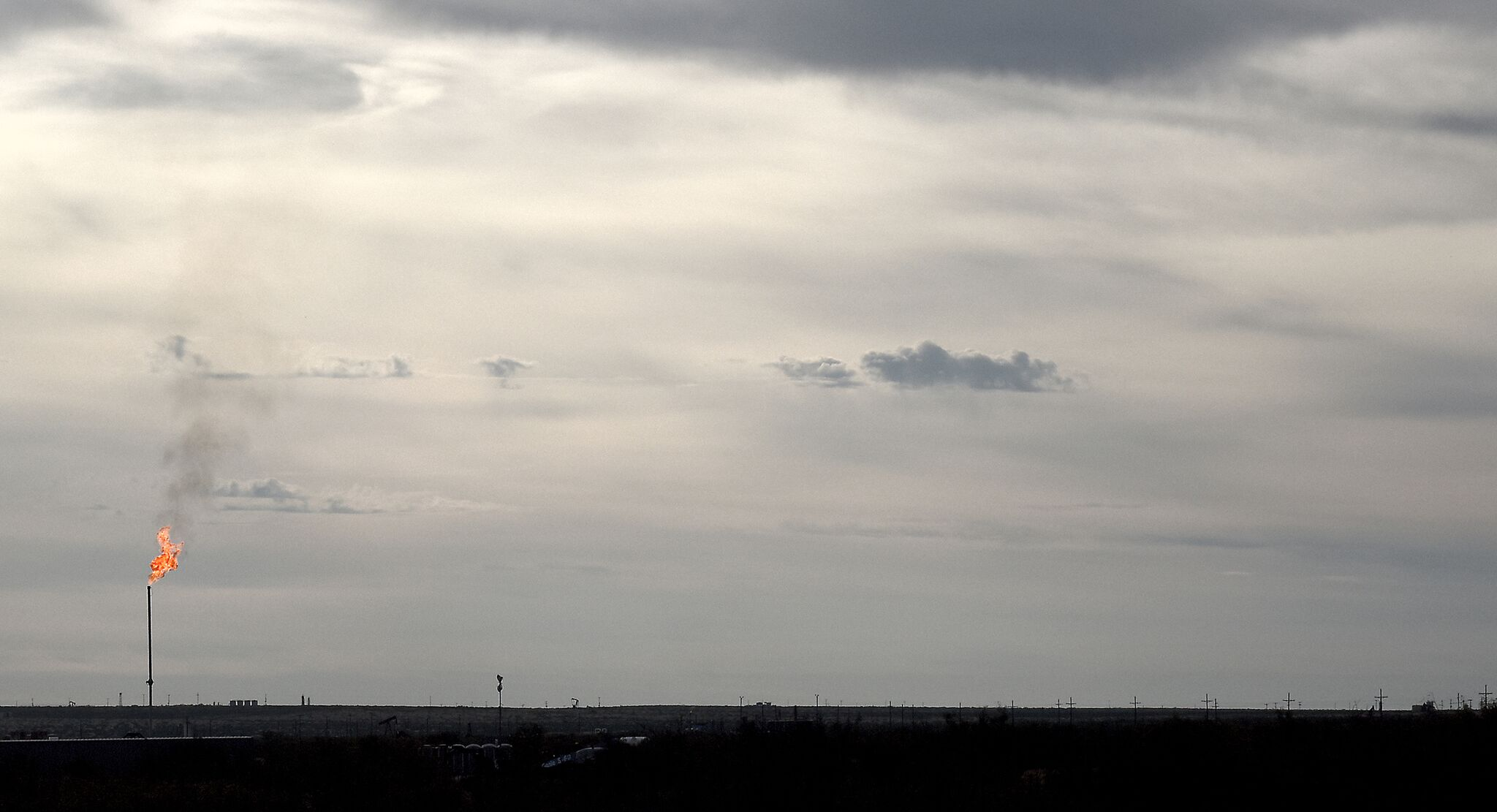 Natural gas flare in the Permian Basin near Midland, Texas