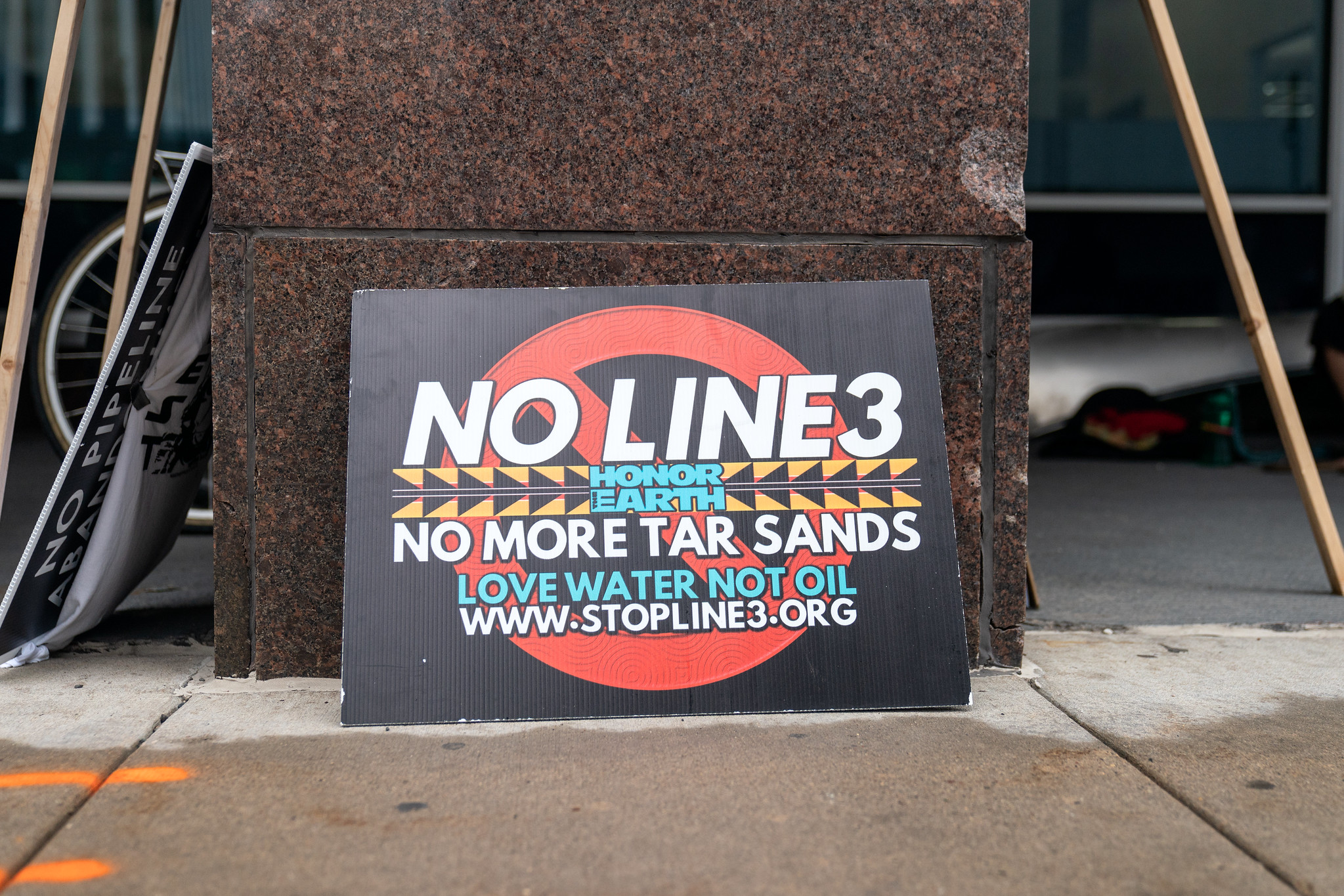 Honor the Earth's 'No Line 3' pipeline sign outside the Minnesota Public Utilities Commission building