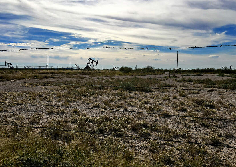 Wells dot the desert atop the Permian Basin in Texas. Credit: © 2016 Laura Evangelisto.