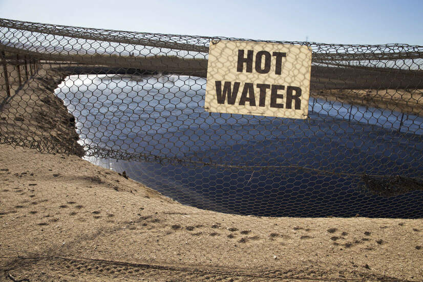 Unlined waste pit for fracking wastewater in California. 