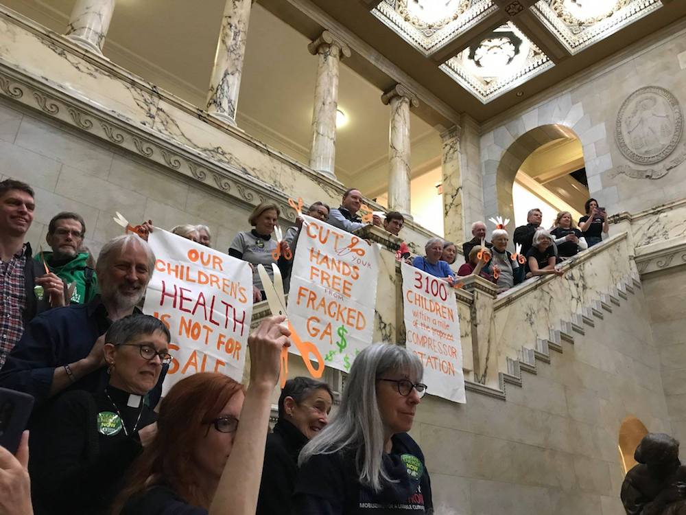 Rally calling on Governor Charlie Baker to stop accepting fossil fuel money