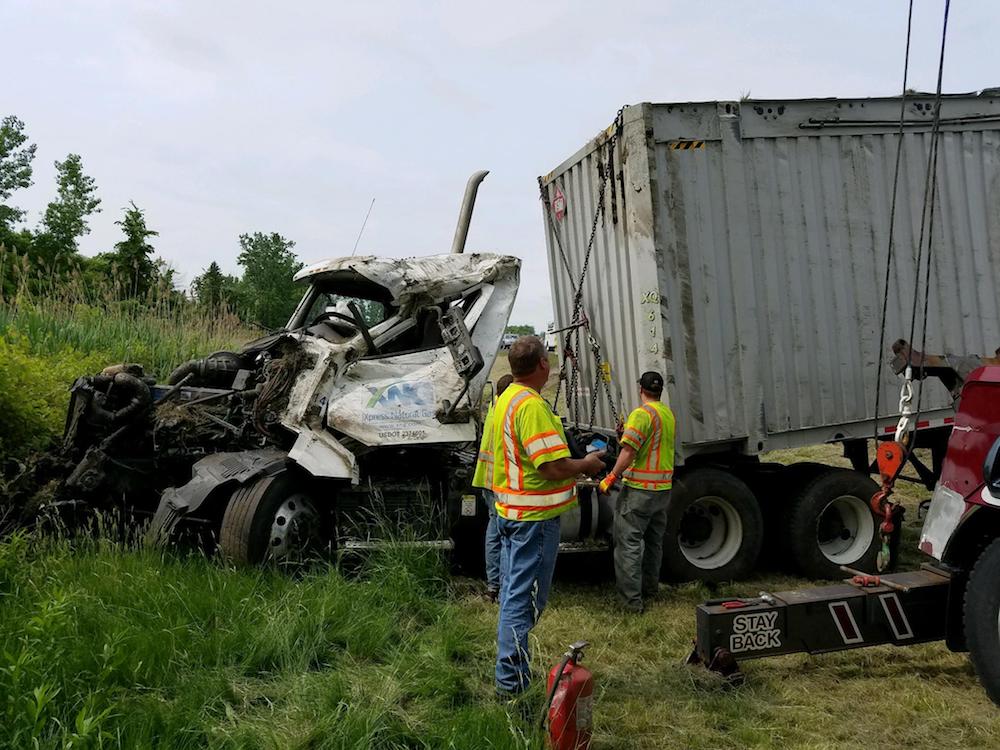 Cleaning up after XNG truck rolled over in Albany County, New York